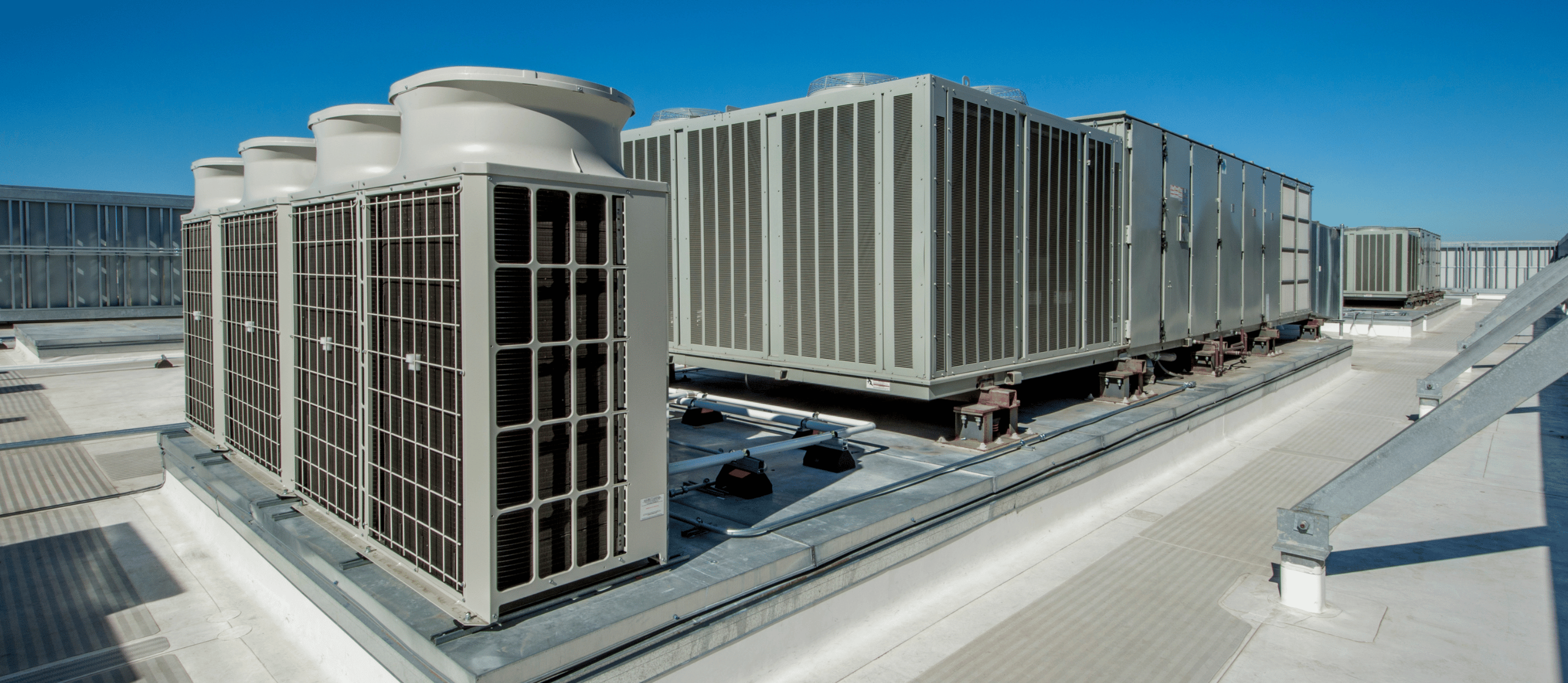 Rocket Air Conditioning technician working on commercial rooftop HVAC equipment